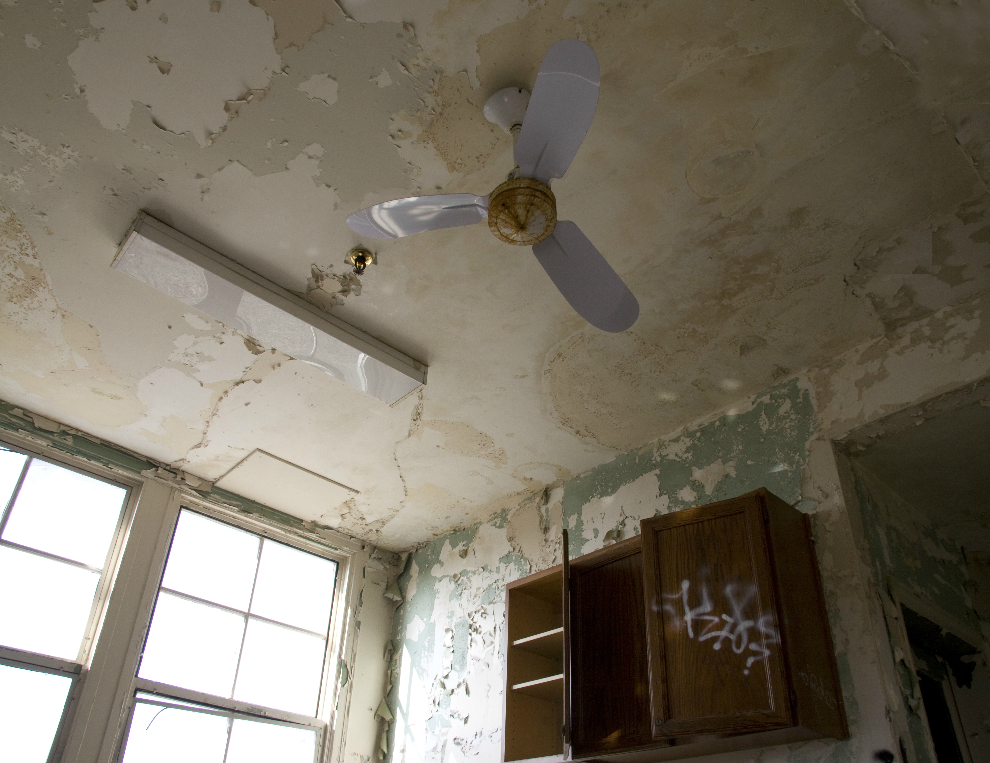 CEILING FAN - remnants of objects that remind us that this place was once used everyday.