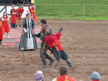 Two combatants at the Ontario Renaissance Festival duke it out